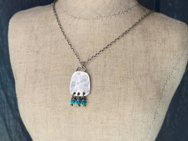 shield pendant with turquoise