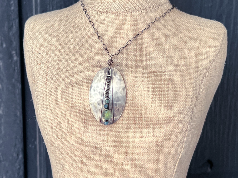 wire-wrapped shield pendant